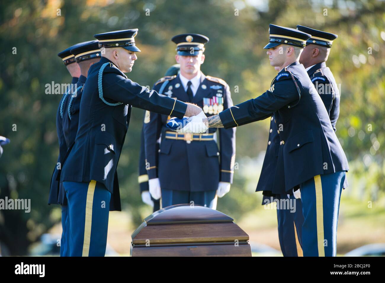 'The U.S. Army Honor Guard, The 3d U.S. Infantry Regiment (The Old Guard) Caisson Platoon, and The U.S. Army Band, “Pershing’s Own”, conduct the funeral of U.S. Army Staff Sgt. Bryan Black in Section 60 of Arlington National Cemetery, Arlington, Virginia, Oct. 30, 2017.  Black, a native of Puyallup, Washington, was assigned to Company A, 2nd Battalion, 3rd Special Forces Group (Airborne) on Fort Bragg, North Carolina when he died from wounds sustained during enemy contact in the country of Niger in West Africa, Oct. 4, 2017.  Ryan McCarthy, acting secretary, U.S. Army; Gen. Mark Milley, chief Stock Photo