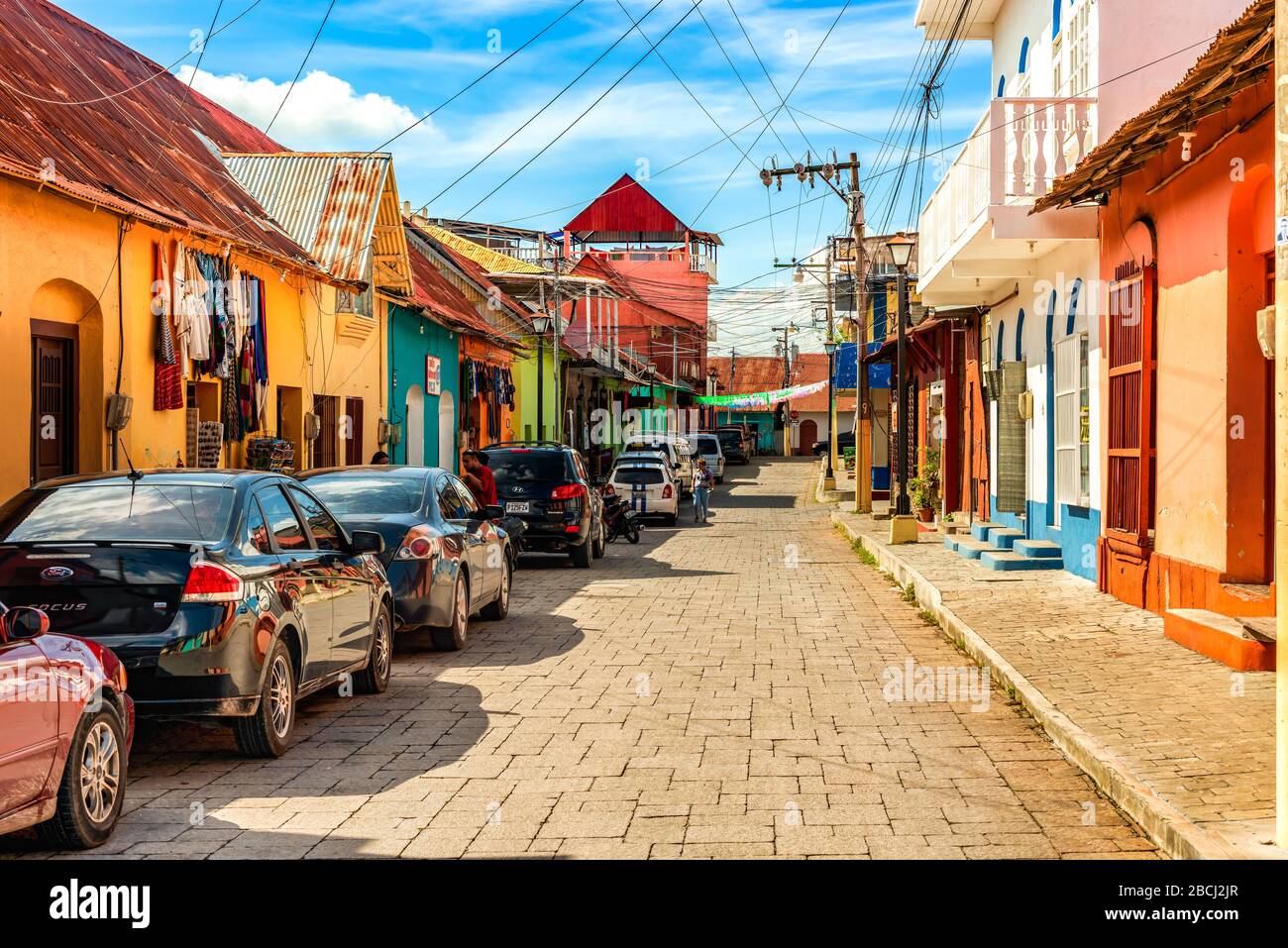 Flores, Guatemala - December 15, 2016:  View at the street and houses located in historic district of the town of Flores in Guatemala. Stock Photo