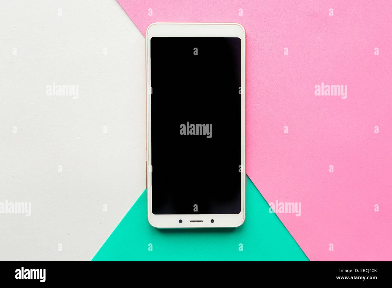 Download Mockup Phone On Geometric Pink White And Green Paper Background Stock Photo Alamy PSD Mockup Templates