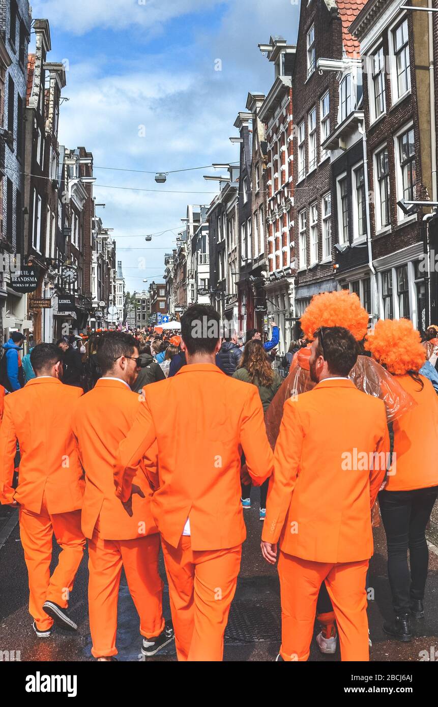 Amsterdam, Netherlands - April 27, 2019: Young people dressed in