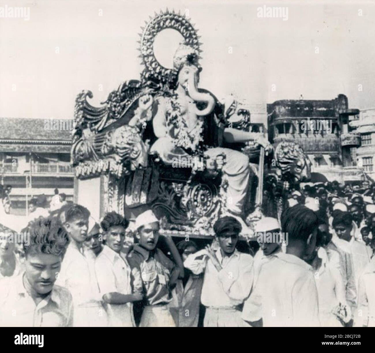 'English: Hindu Idol God Of Fortune Ganesh Parade Through Bombay in 1946; 25 April 2012; http://4.bp.blogspot.com/-83AzHHAPgxA/TrwjklbY-bI/AAAAAAAAMbE/Lngenh6kHgU/s1600/1946+Hindu+Idol+God+Of+Fortune+Ganesh+Parade+Through+Bombay+India+Wire+Photo.jpg; http://www.oldindianphotos.in/; ' Stock Photo