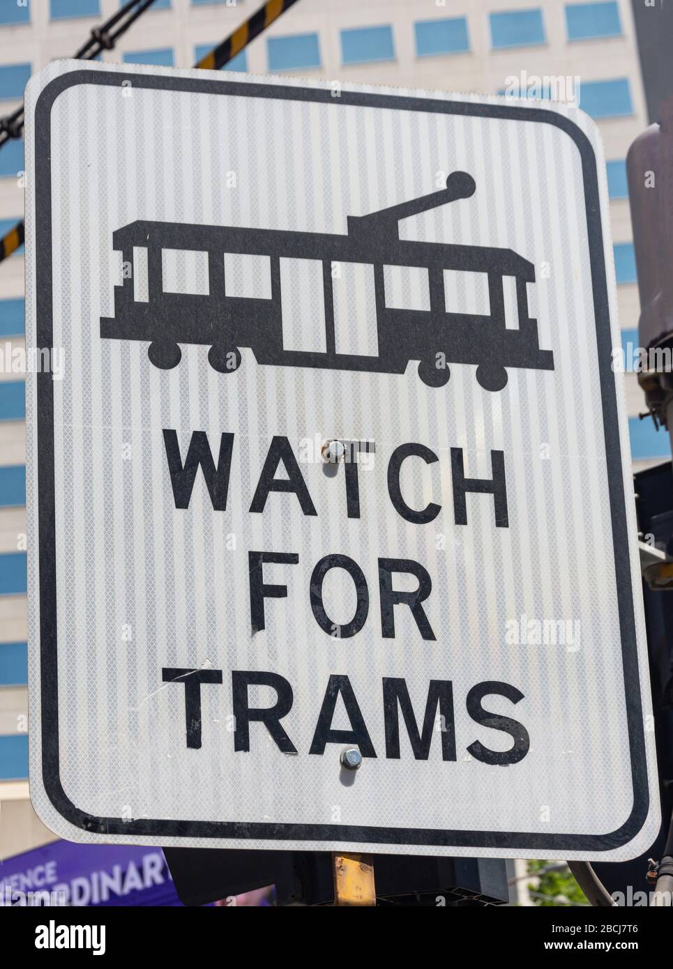 'Watch for trams' sign, Bourke Street, City Central, Melbourne, Victoria, Australia Stock Photo