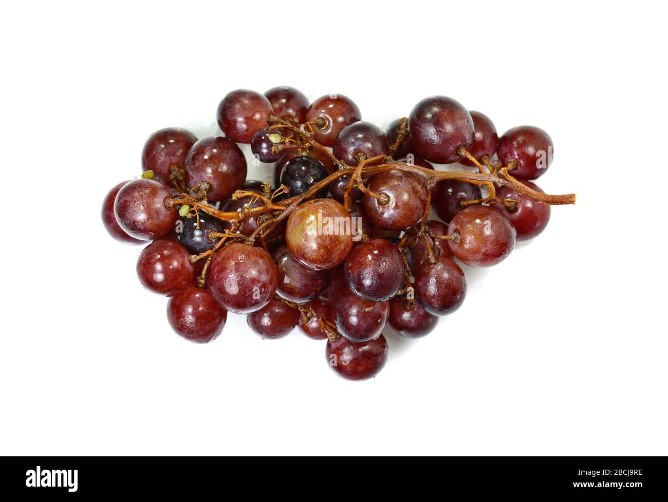 A bunch of overripe grapes isolated on white background Stock Photo - Alamy