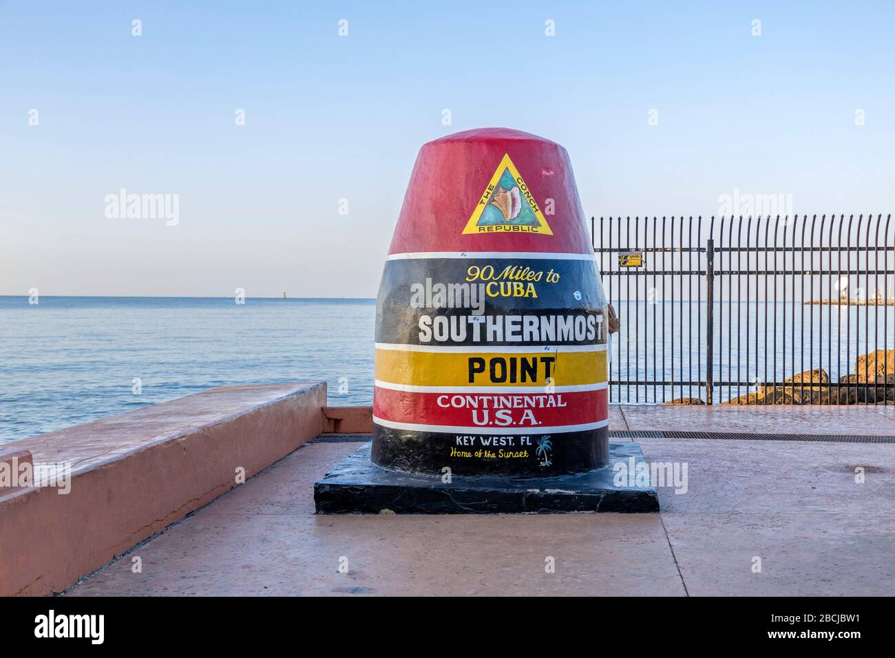 Southernmost Point, a popular tourist attraction in Key West, Florida, with no tourists around. Stock Photo