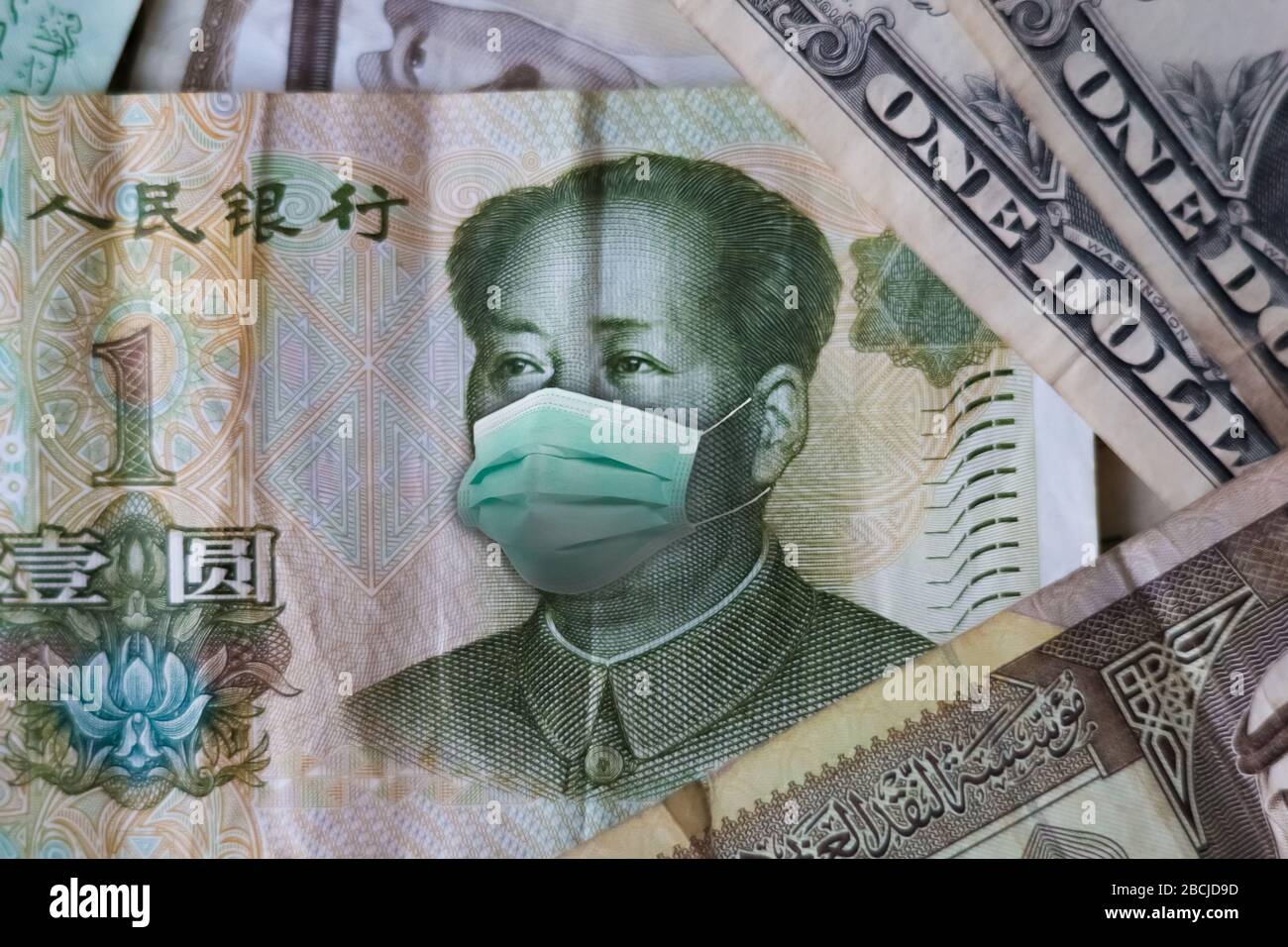 Coronavirus Wuhan virus illness. Concept: Quarantine in China, 1 Yuan banknote with face mask. Economy and financial markets affected by corona virus Stock Photo