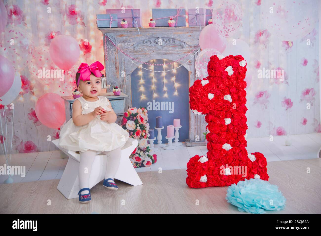 Girl's first Birthday decorations. Party for little girl. Number one on  background . Interior decoration for a kids child birthday is 1 year in  ultra Stock Photo - Alamy