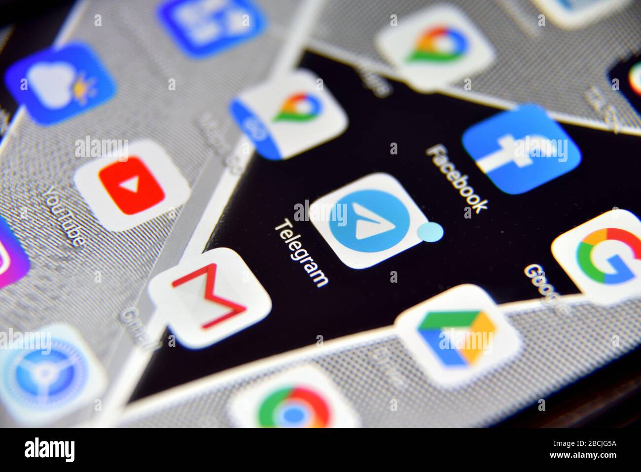 Valverde (CT), Italy - April 04, 2020: Close-up view of Telegram icon app on an Android smartphone, including other icons. Stock Photo
