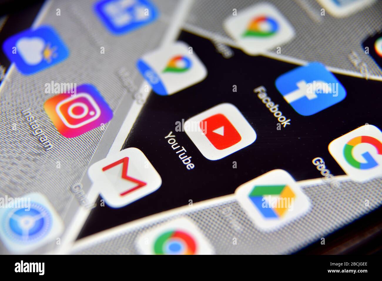 Valverde (CT), Italy - April 04, 2020: Close-up view of YouTube icon app on an Android smartphone, including other icons. Stock Photo