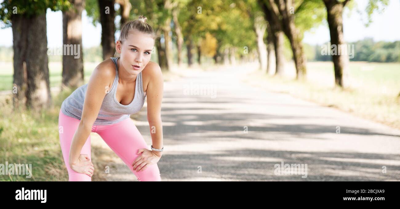 young woman stretching Stock Photo