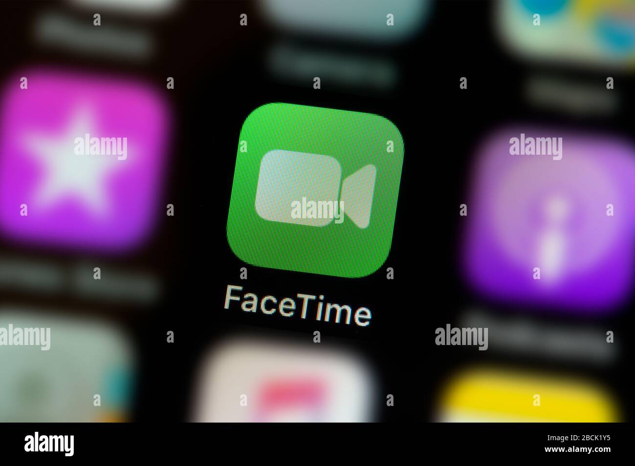 A close-up shot of the Facetime app icon, as seen on the screen of a smart phone (Editorial use only) Stock Photo
