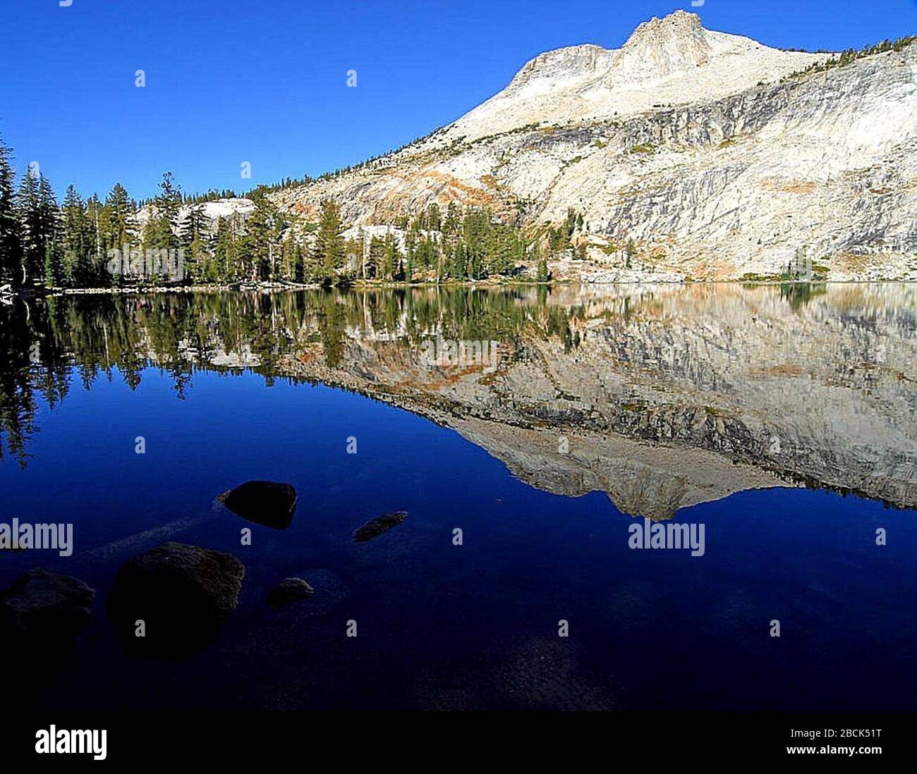 'English: May Lake and Mount Hoffmann, Yosemite National Park; Taken on 5 September 2004; Archived source link; Jon Sullivan; ' Stock Photo
