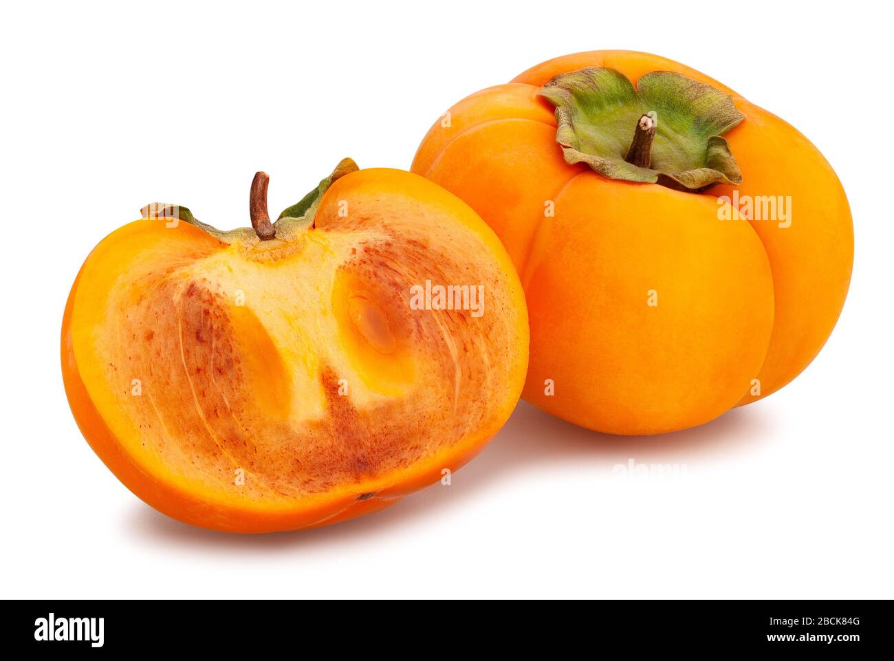 sliced kinglet persimmons path isolated on white Stock Photo