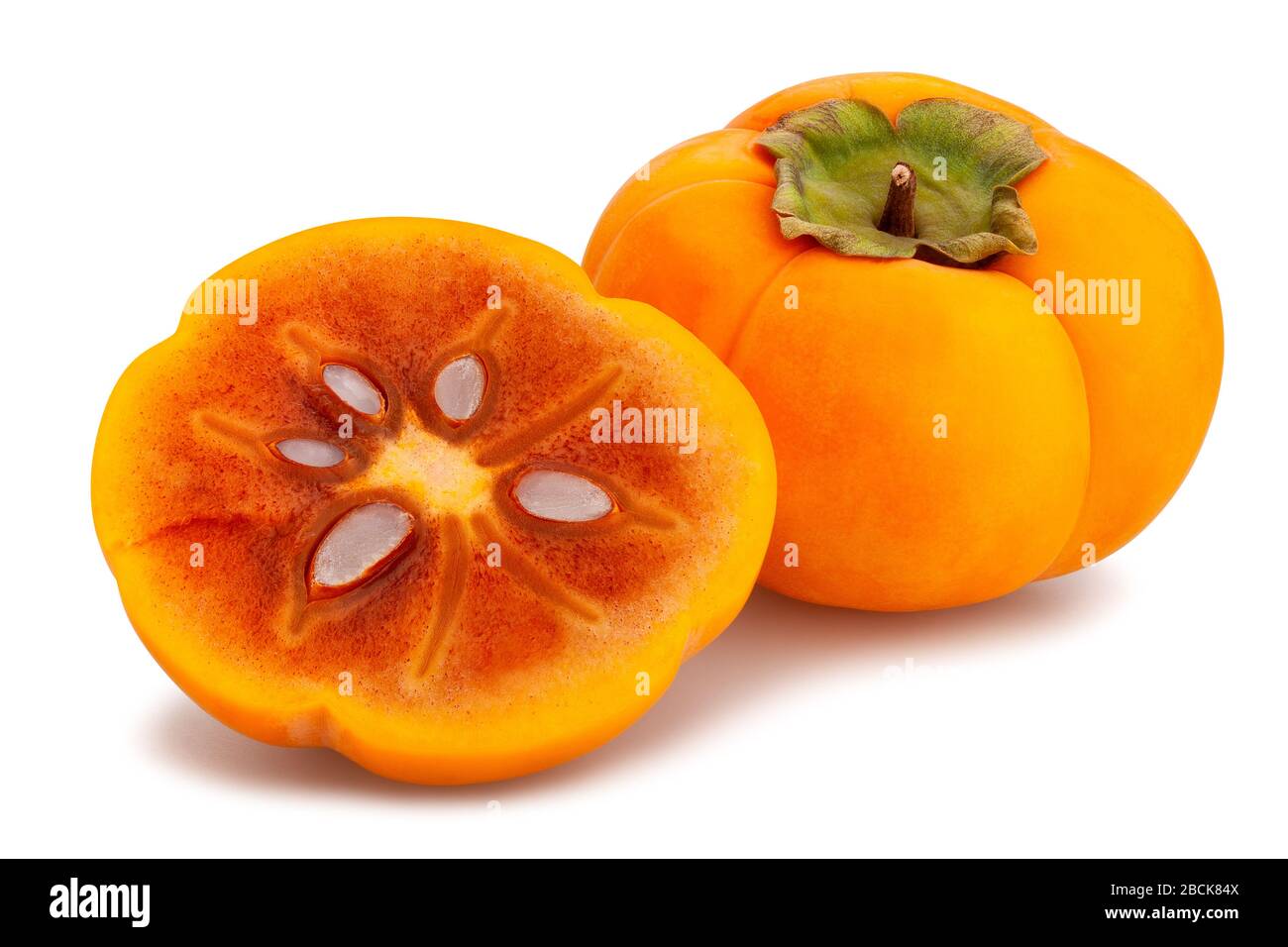 sliced kinglet persimmons path isolated on white Stock Photo