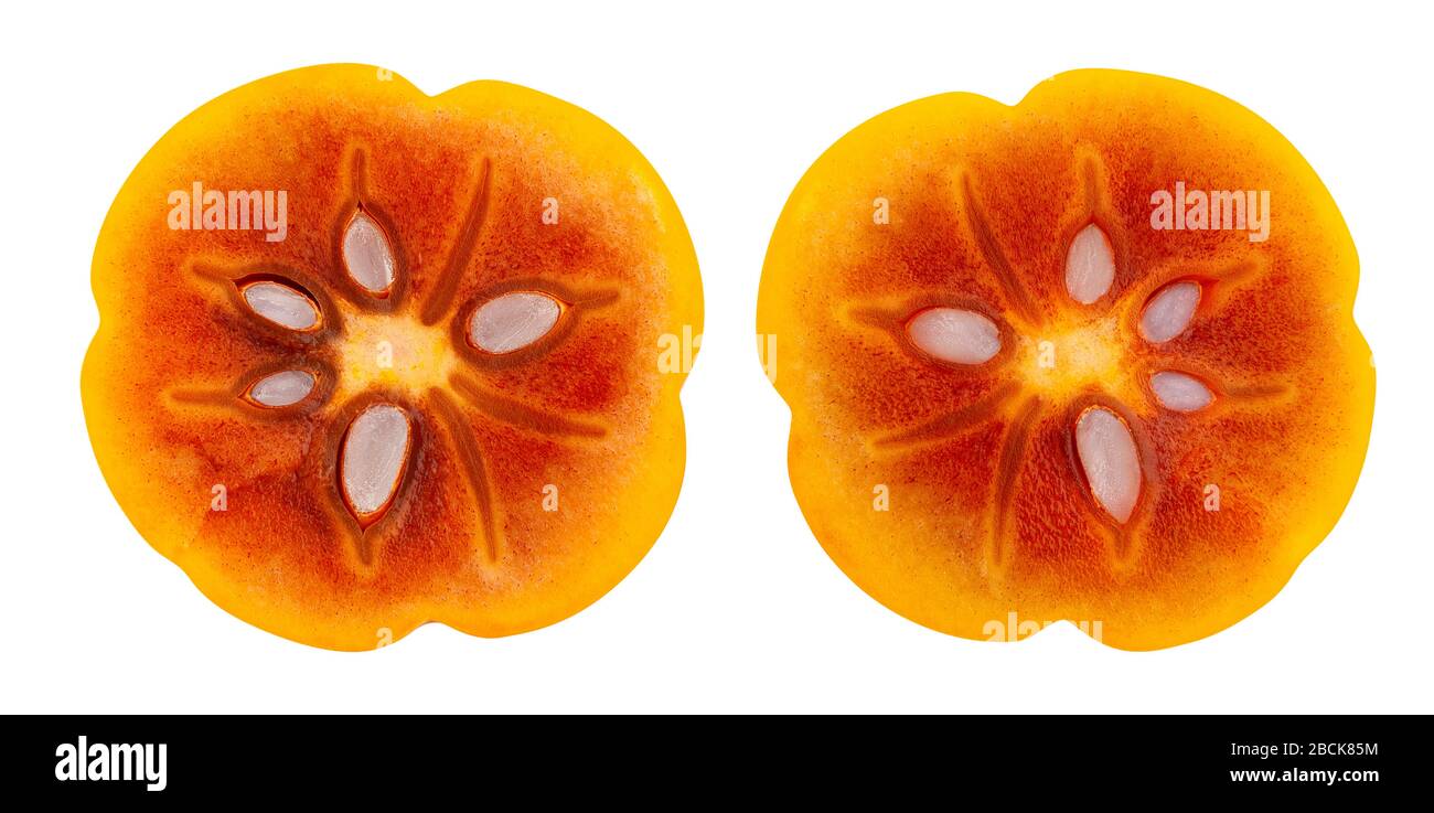 sliced kinglet persimmons path isolated on white Stock Photo