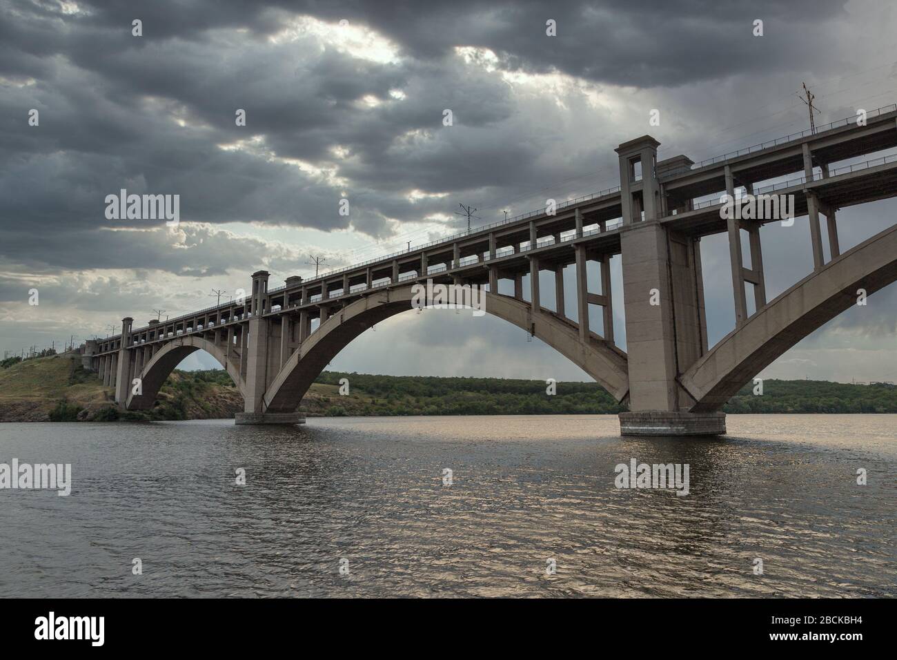 Preobrazhensky bridge across the Dnieper River to the island of Khortitsa in the city of Zaporozhye, Ukraine. Stock Photo