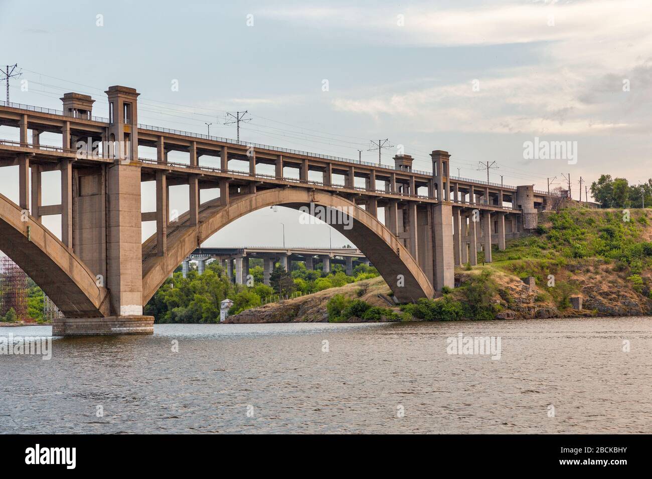 Preobrazhensky bridge across the Dnieper River to the island of Khortitsa in the city of Zaporozhye, Ukraine. Stock Photo