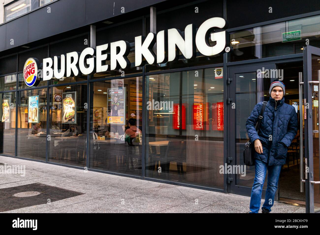 Warsaw, Poland - January 22, 2020: Burger King fast food chain restaurant  and people with logo sign by entrance near Centrum city center in Warszawa  Stock Photo - Alamy
