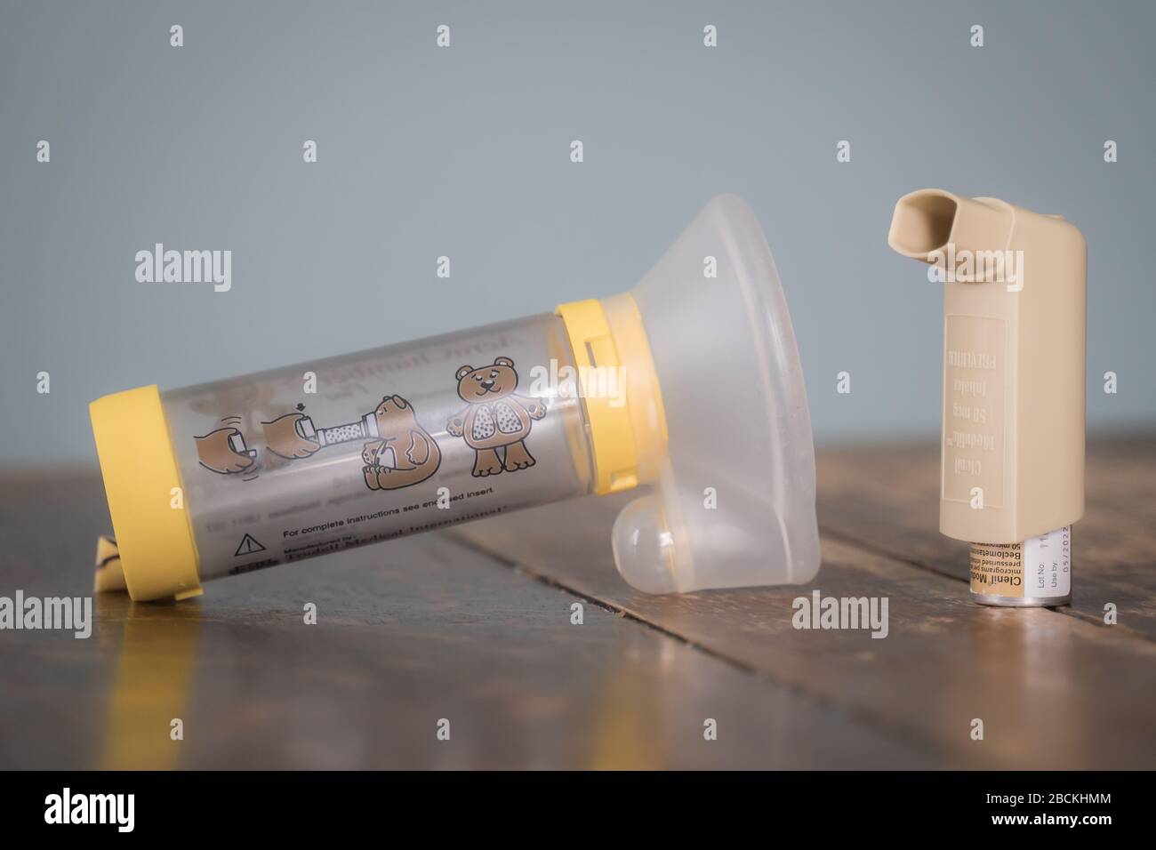 London, UK - April 3, 2020 - Clenil (beclomethasone) inhaler and child Aerochamber spacer; commonly prescribed medication for asthma treatment Stock Photo