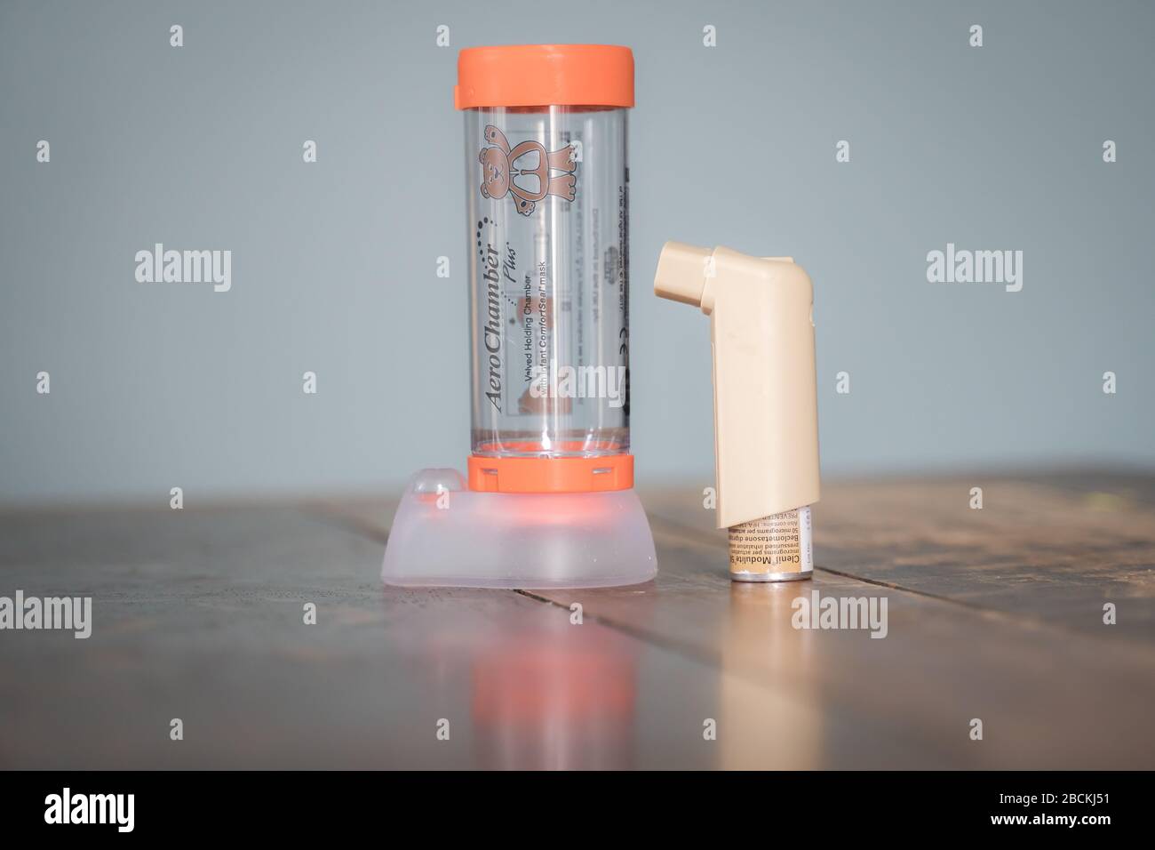London, UK - April 3, 2020 - Clenil (beclomethasone) inhaler and infant Aerochamber spacer; commonly prescribed medication for asthma treatment Stock Photo