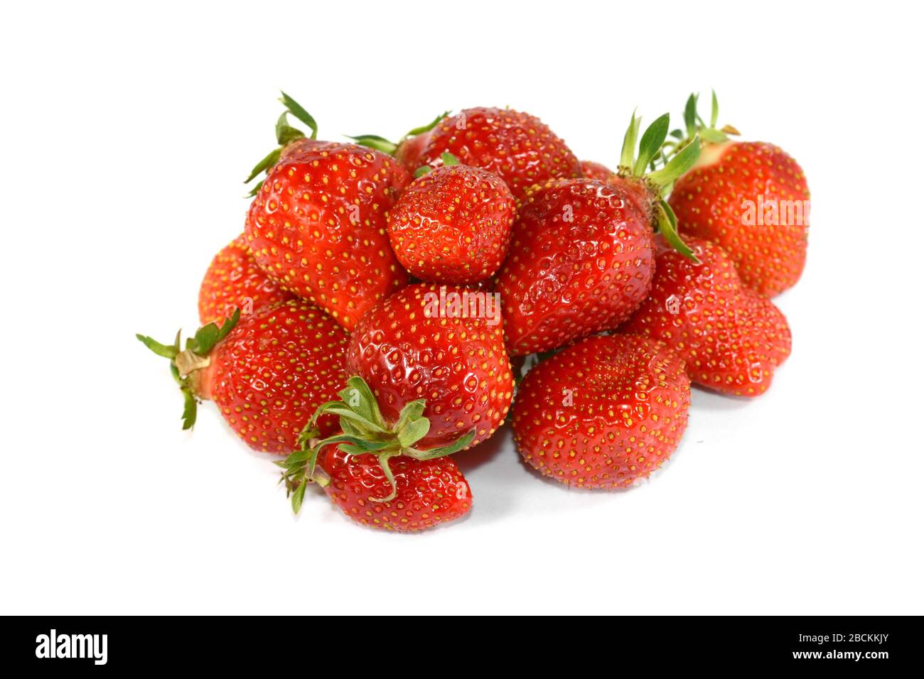 Strawberries isolated on a white background Stock Photo - Alamy