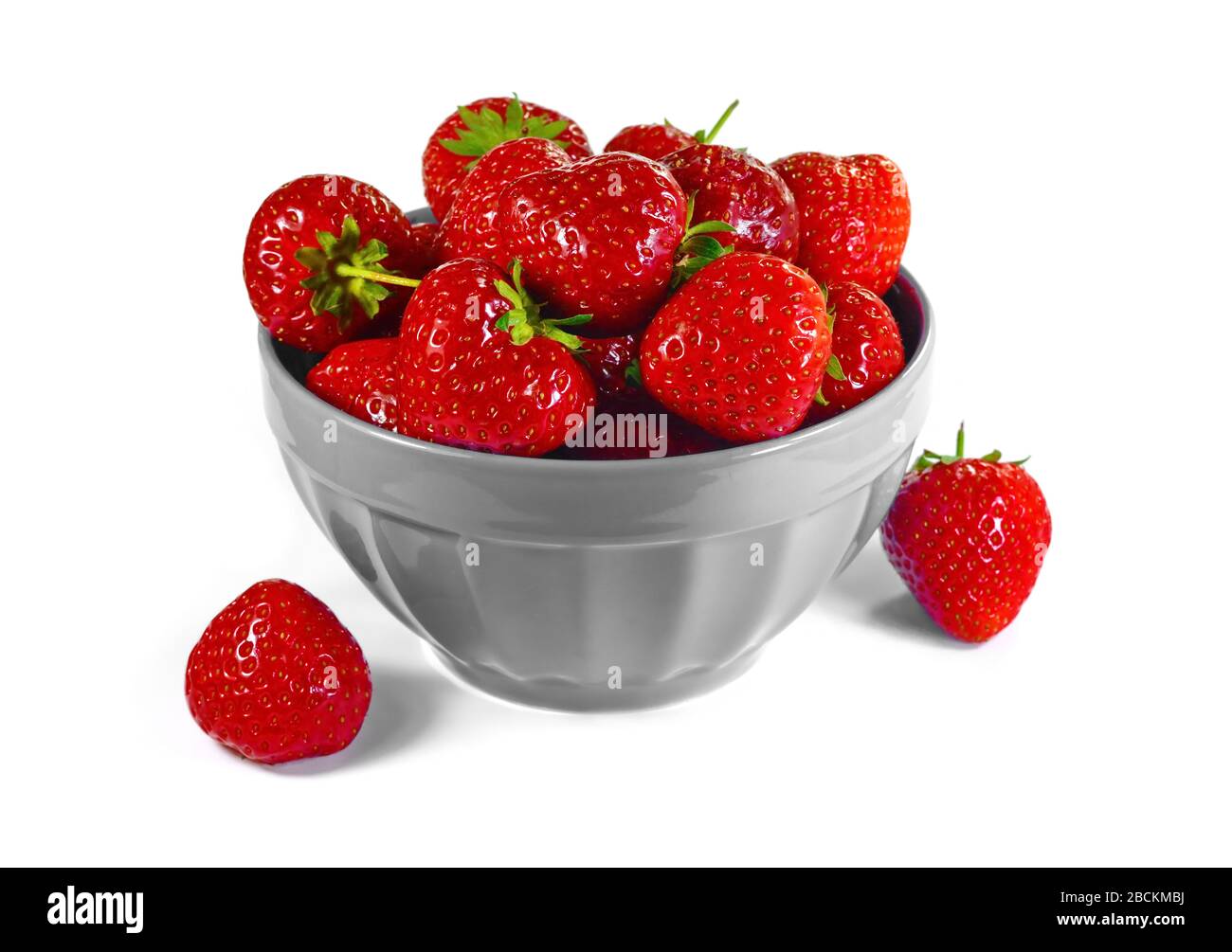 Strawberries isolated on a white background Stock Photo - Alamy