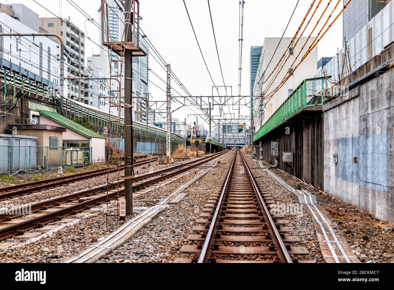 Tokyo, Japan - March 28, 2019: Shinjuku urban street road and buildings ...