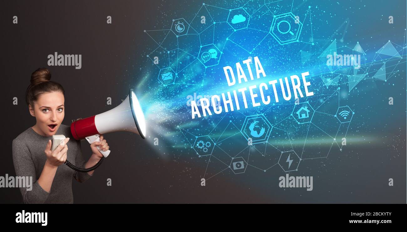 Shouting Data Young woman shouting in megaphone with DATA ARCHITECTURE inscription ...