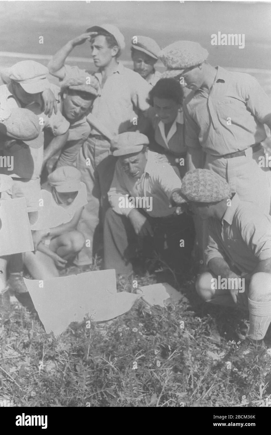 English Settlers Studying The Plan Prepared For The Establishing Of The Kibbutzim Shaar Hagolan And Massada In The Jordan Valley I U O O I U Ss Ss C U I Ss O E I O U C I I I U U I U I I E U English Settlers Studying The Plan Prepared For The Establishing Of The Kibbutzim Shaar Hagolan And Massada In The Jordan Valley I U O O I U Ss Ss C U I Ss O E I O U C I I I U U I U I I E U