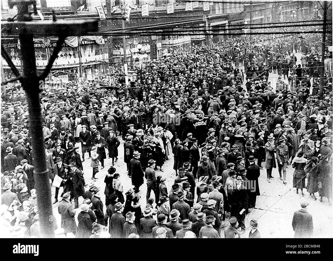 'Armistice Day celebrations, Queen and Yonge Streets, Toronto, Canada.; 1918; This image is available from the City of Toronto Archives, listed under the archival citation Fonds 1244, Item 890. This tag does not indicate the copyright status of the attached work. A normal copyright tag is still required. See Commons:Licensing for more information. Deutsch | English | suomi | français | magyar | македонски | Nederlands | português | +/−; William James  (1866–1948)        Alternative names  William James Sr.  Description Canadian photographer(One of James’ two sons, William Horace or Norman, may Stock Photo