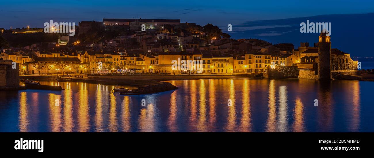 Long exposure night image of the Town and harbour of Collioure on the Mediterranean coast of southern France. Stock Photo