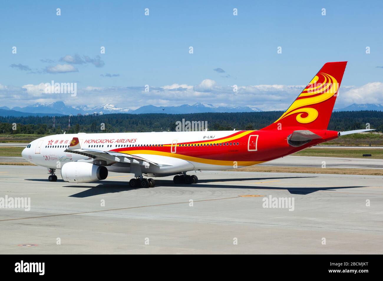 Vancouver, Canada - July 3, 2017: Hong Kong Airlines Airbus A330-300 on the runway of Vancouver International Airport. The airline is headquartered in Stock Photo