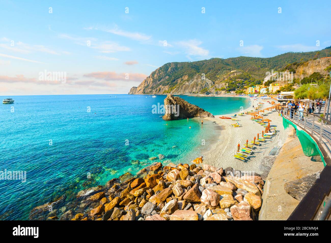 The sandy beach at the Italian village of Monterosso al Mare on the Ligurian coast, part of the Cinque Terre, an Unesco World Heritage Site. Stock Photo