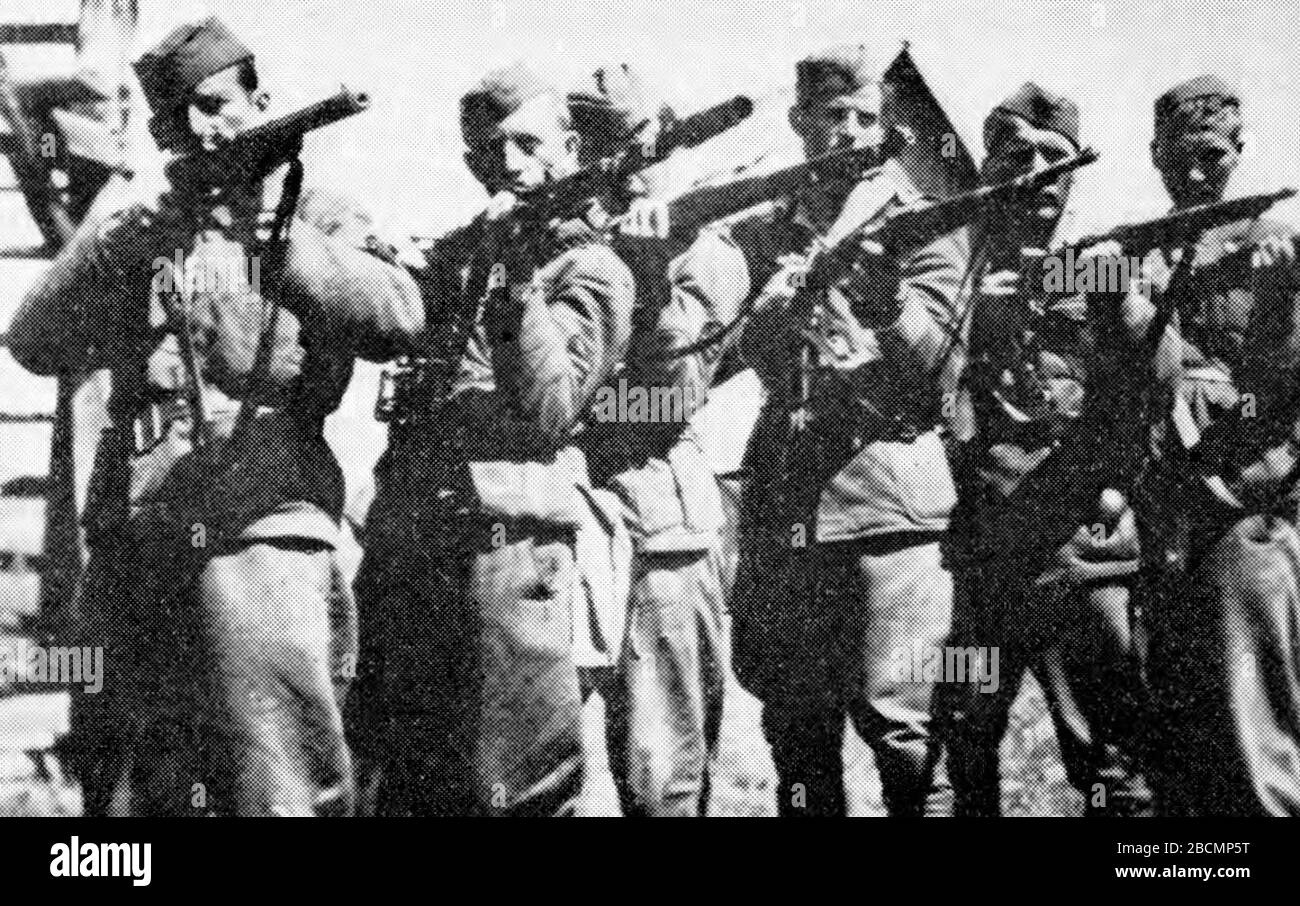"Slovenščina: Štab 2. bataljona Gradnikove brigade. Z leve na desno: Alojz Tomšič (politični komisar), Franc Mavrič (namestnik komandanta), Silvo Koler (namestnik političnega komisarja) in Ibro Ibraimi (komandant).; between 1943 and 1945 date QS:P,+1943-00-00T00:00:00Z/8,P1319,+1943-00-00T00:00:00Z/9,P1326,+1945-00-00T00:00:00Z/9; Book Gradnikova brigada. Petelin, Stanko. Nova Gorica, Soča, 1966.; Unknown author; " Stock Photo