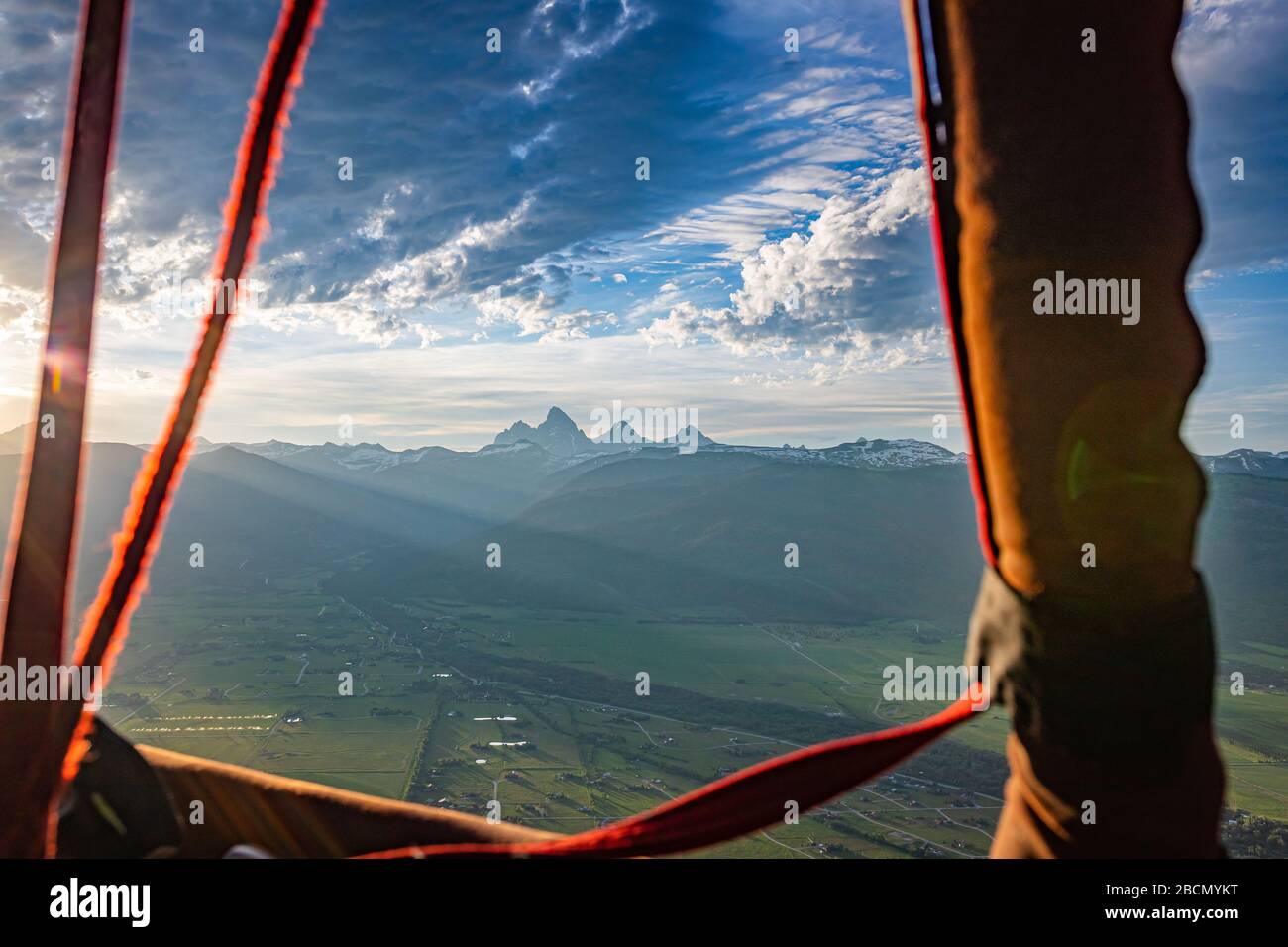 A hot air balloon view from Driggs, Idaho of the Grand Tetons  in the Rocky Mountains of Wyoming. Stock Photo