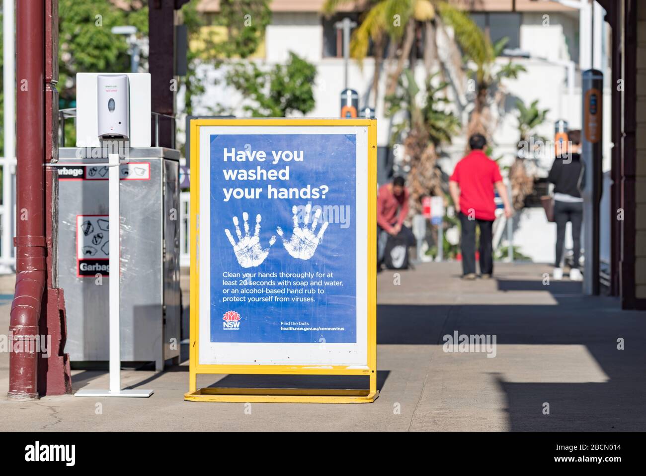 Sydney, Australia April 5, 2020: A state government issued 'Have you washed your hands?' sign and a no-touch spray-dose hand sanitiser at Gordon railway station in Sydney, New South Wales, Australia Stock Photo