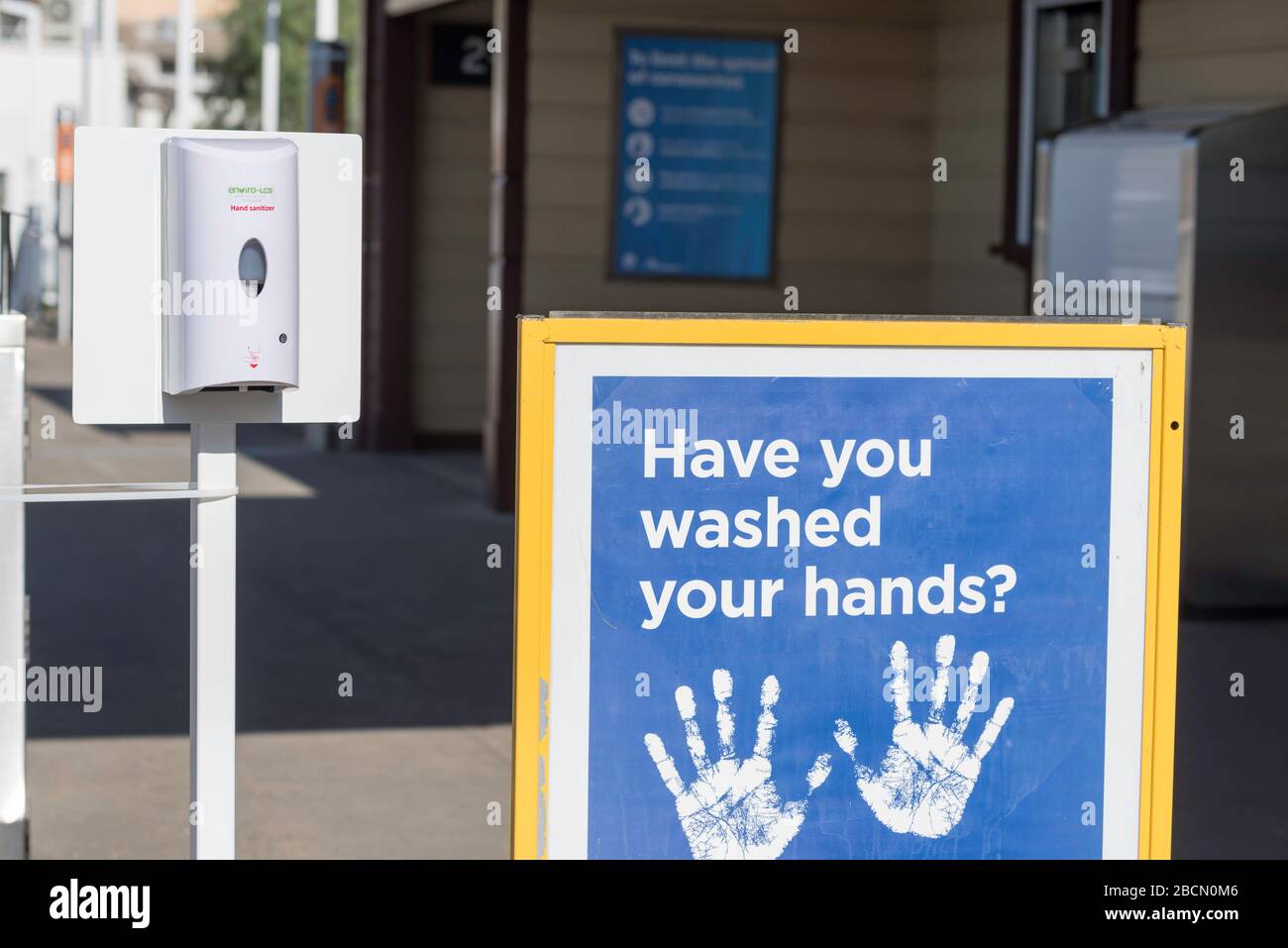 Sydney, Australia April 5, 2020: A state government issued 'Have you washed your hands?' sign and a no-touch spray-dose hand sanitiser at Gordon railway station in Sydney, New South Wales, Australia Stock Photo