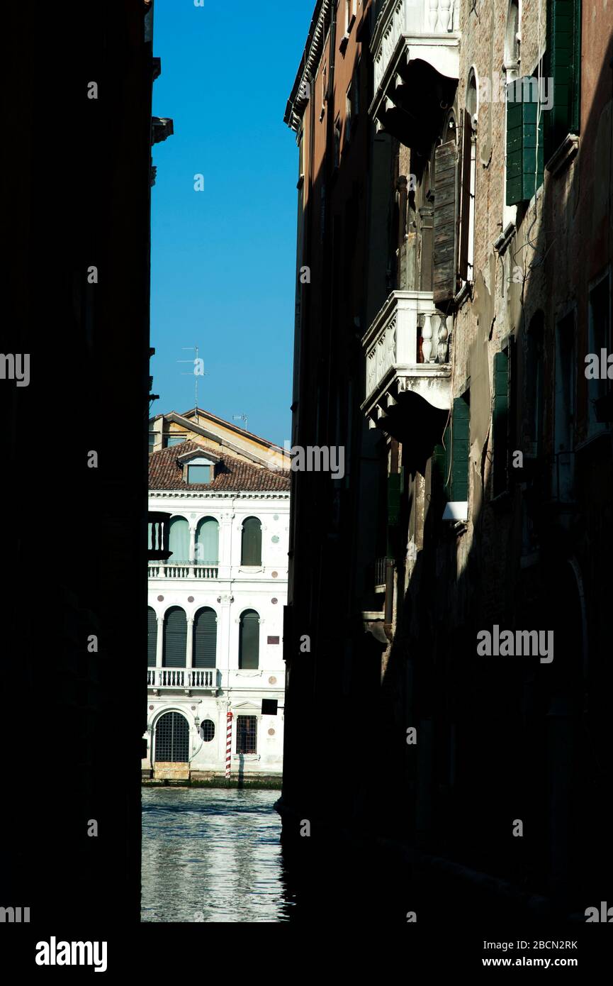 Villa and waterway to Grand Canal through small opening, Grand Canal, Venice, Italy Stock Photo