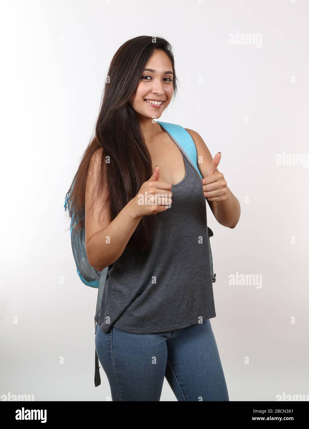 An attractive college student gives you the thumbs up Stock Photo - Alamy