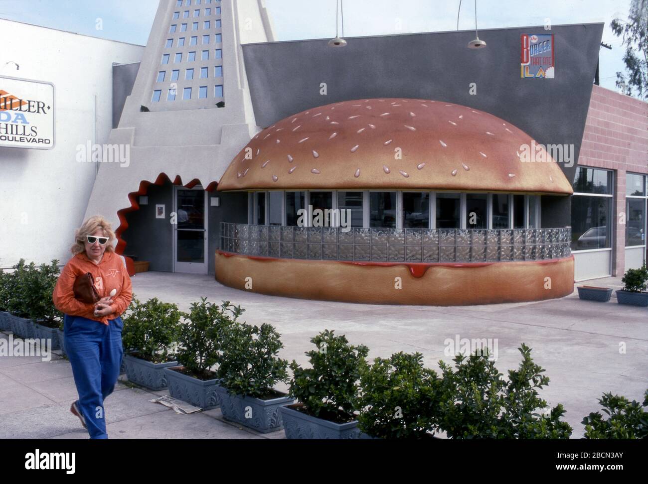 Restaurant shaped like a hamburger with a replica of L.A. City Hall was called 'The Burger That Ate L.A.' and was located on Melrose Avenue in West Hollywood, opened in 1989 and appeared in the pilot episode of the TV show, Melrose Place. Stock Photo