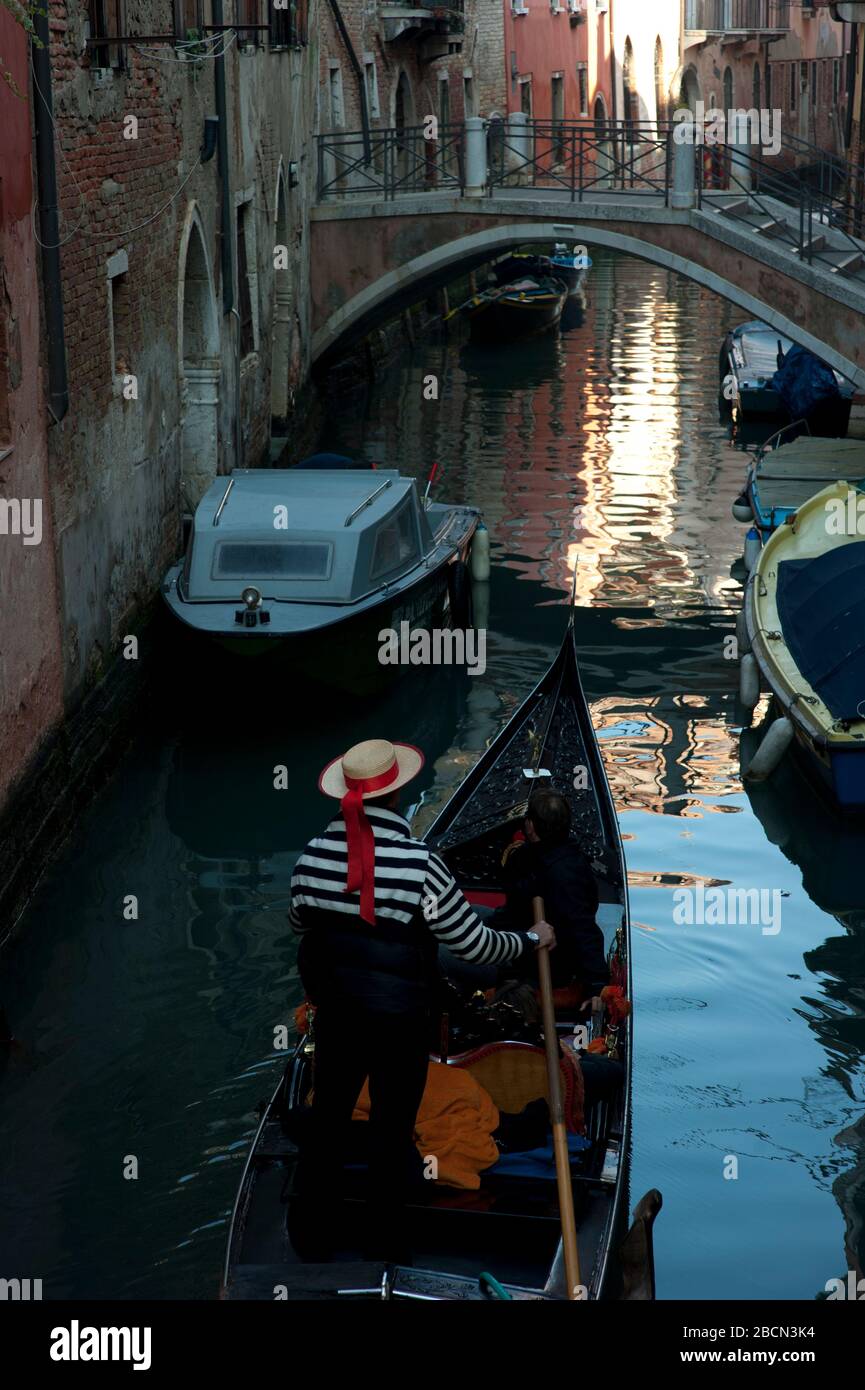Gondola in small canal, Venice, Italy Stock Photo