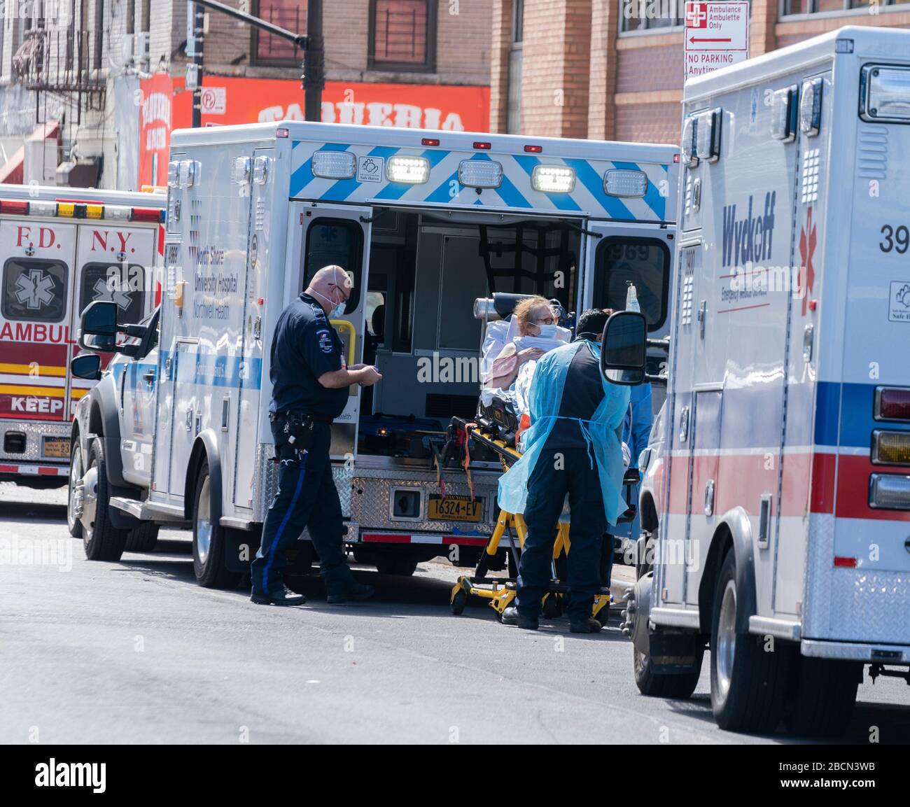 New York, NY April 4, 2020 EMT members bring sick patient to