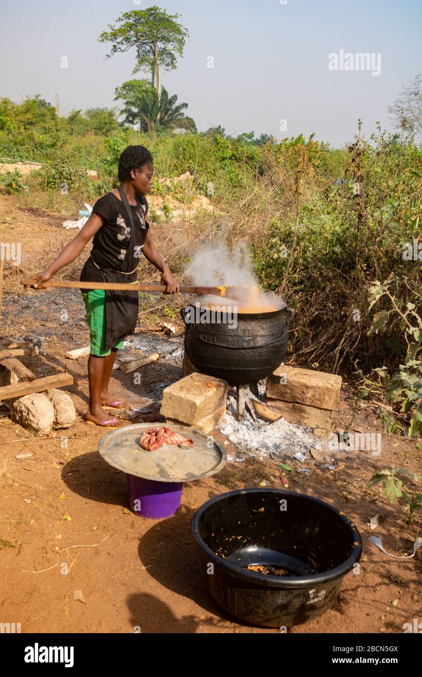 One person cooking in big pot hi-res stock photography and images - Alamy