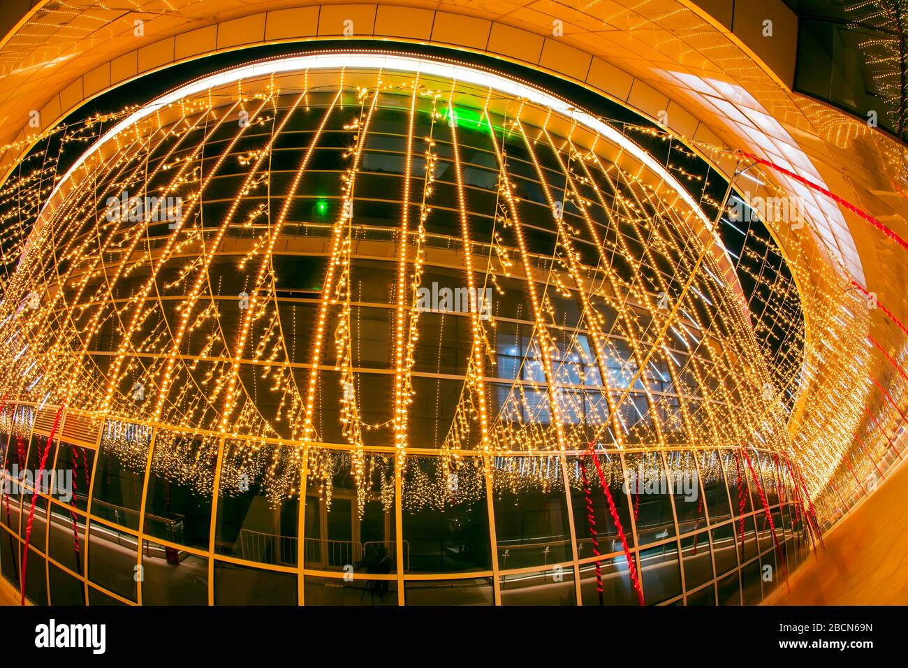 Glass walled buildings at night Stock Photo - Alamy