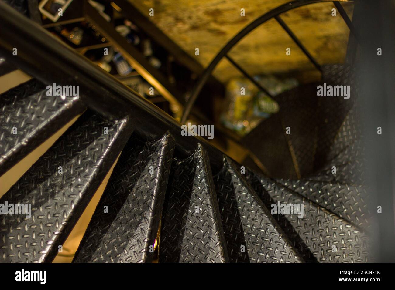 Spiral black metal staircase Stock Photo - Alamy