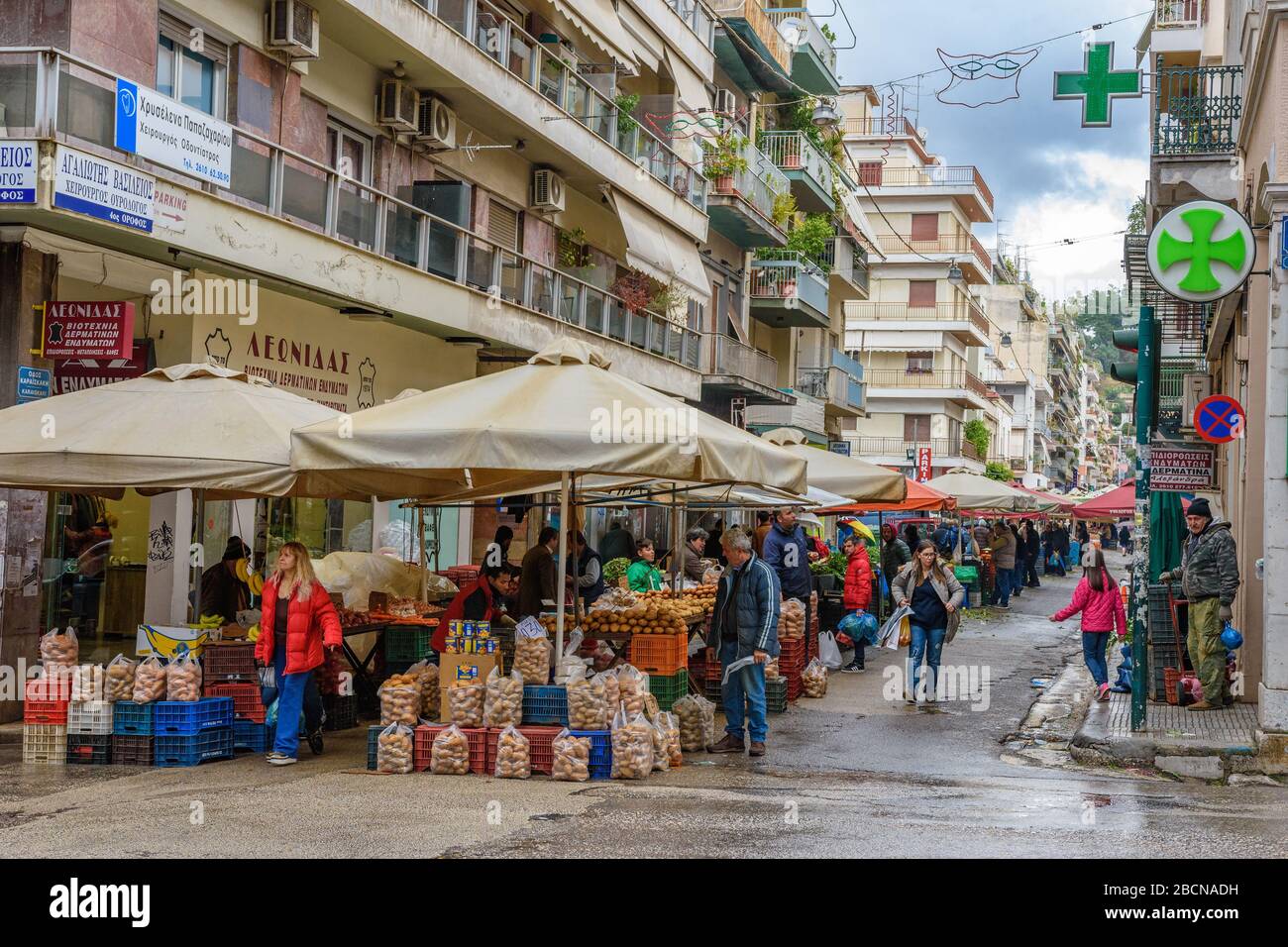 People shopping at the weekly public market of agricultural products in the  city of Patras, Achaea, Greece Stock Photo - Alamy