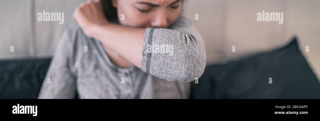 COVID-19 cover Coronavirus reducing of risk of spreading the infection by covering nose and mouth when coughing and sneezing with tissue or flexed elbow. woman cough banner focus on arm. Stock Photo