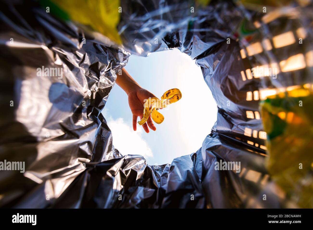 Banana peel was thrown into the garbage bag for disposal. Look from the