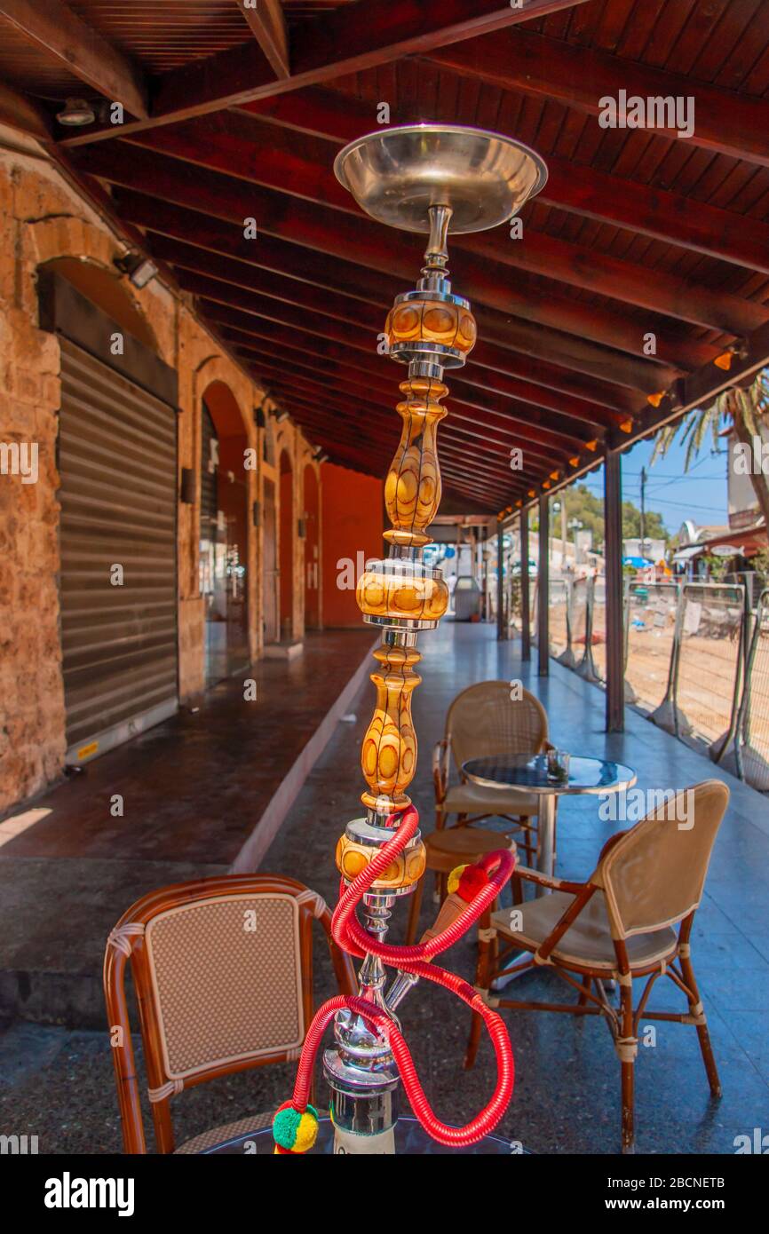 Jaffa, Israel - June 03, 2011: View of an alley with a nargila (hookah), in the old city of Jaffa, now part of Tel-Aviv-Yafo, Israel Stock Photo