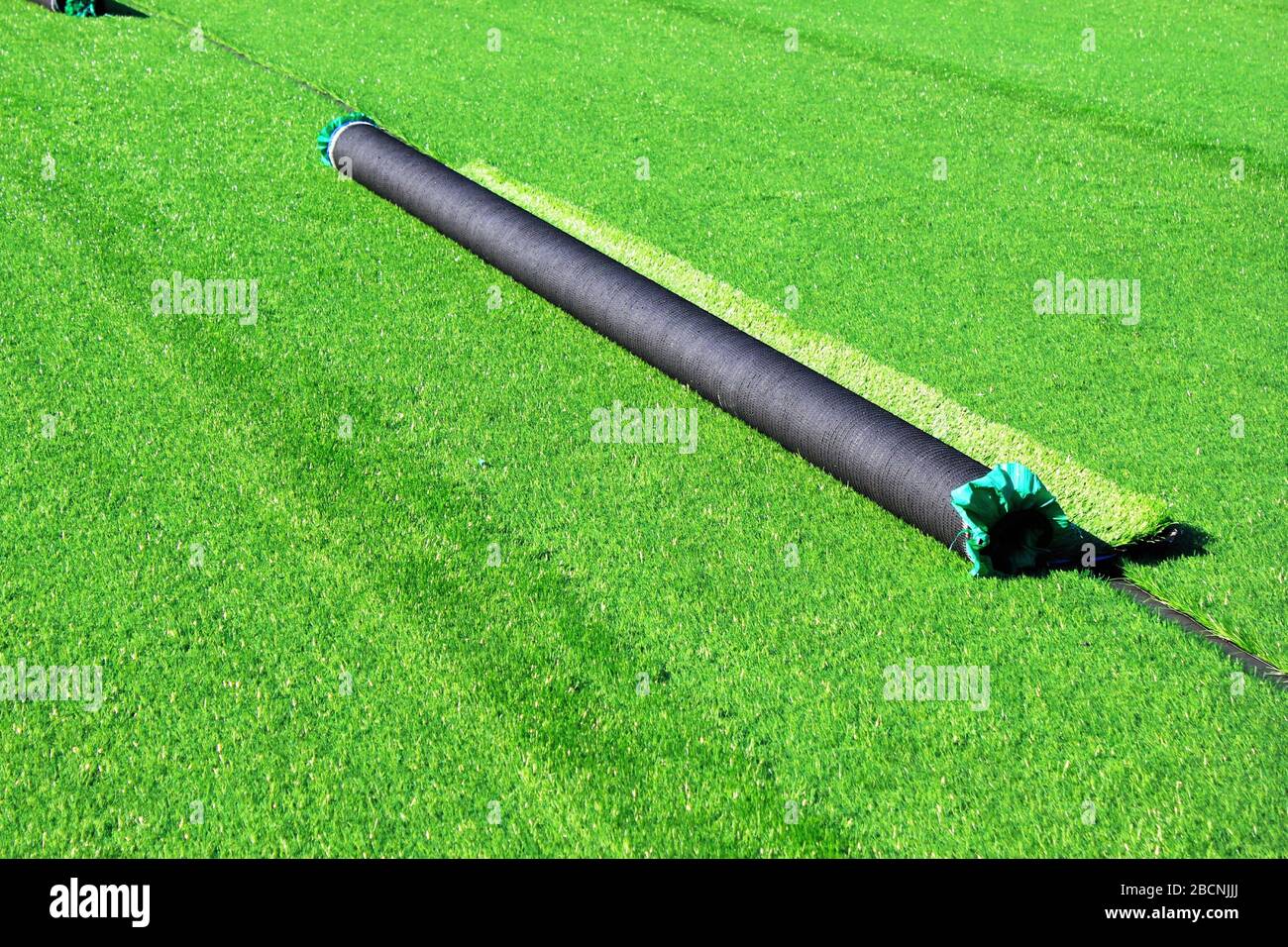 Artificial turf soccer field construction Athens, Greece, February 25