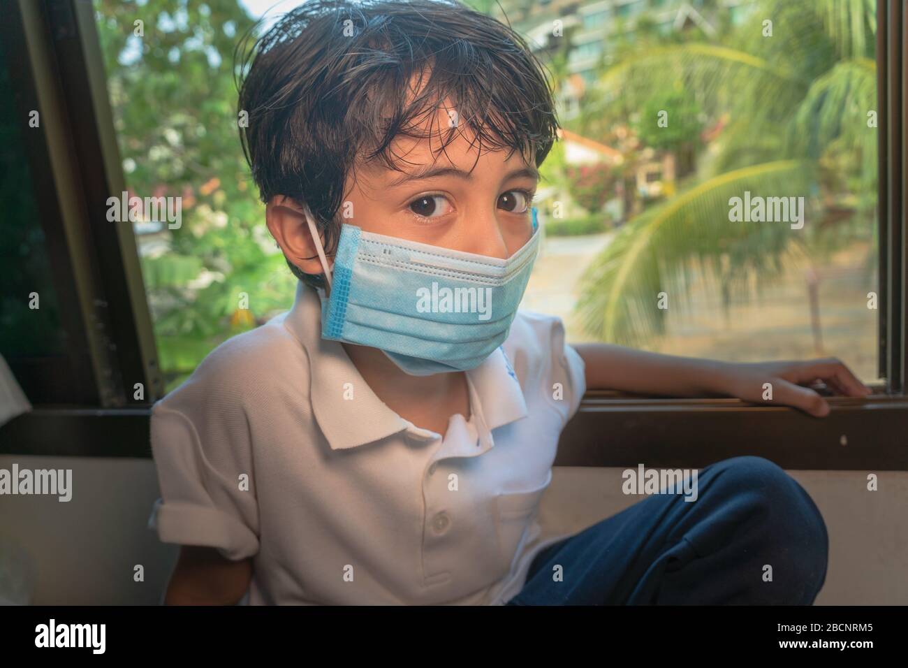 Teen boy not wearing medical mask hi-res stock photography and images ...